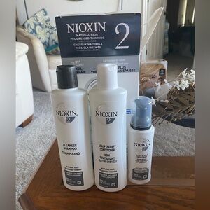 Nioxin System is a top seller for treating hair loss.  New, never used.
